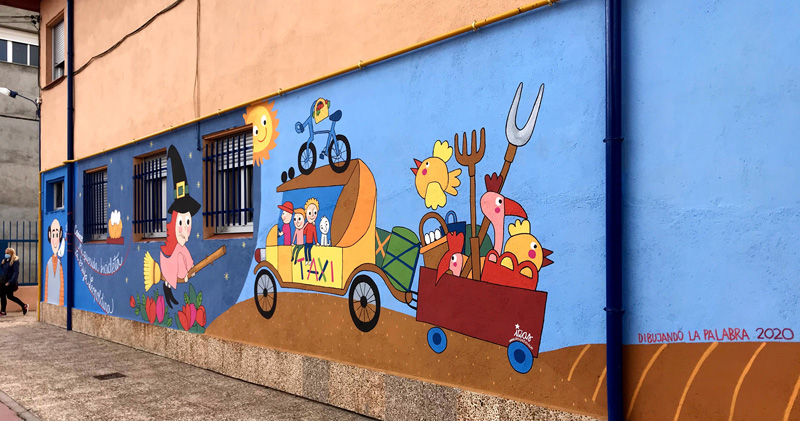 mural izas azulpatio dibujando la palabra madrigal derecha 1